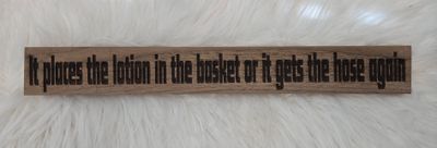 It places the lotion in the basket or it gets the hose again Shelf sitter
