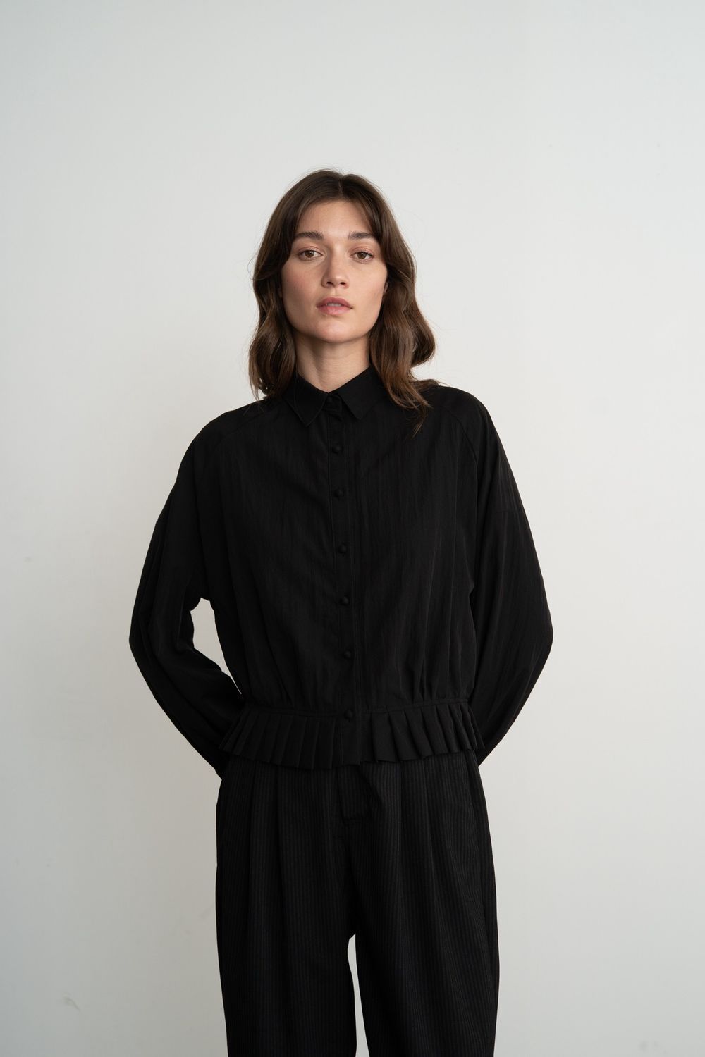 Linda Pleated Hem Blouse