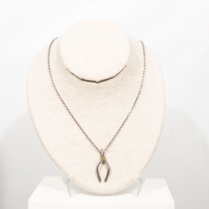 Necklace: Wishbone , Kelly Draper