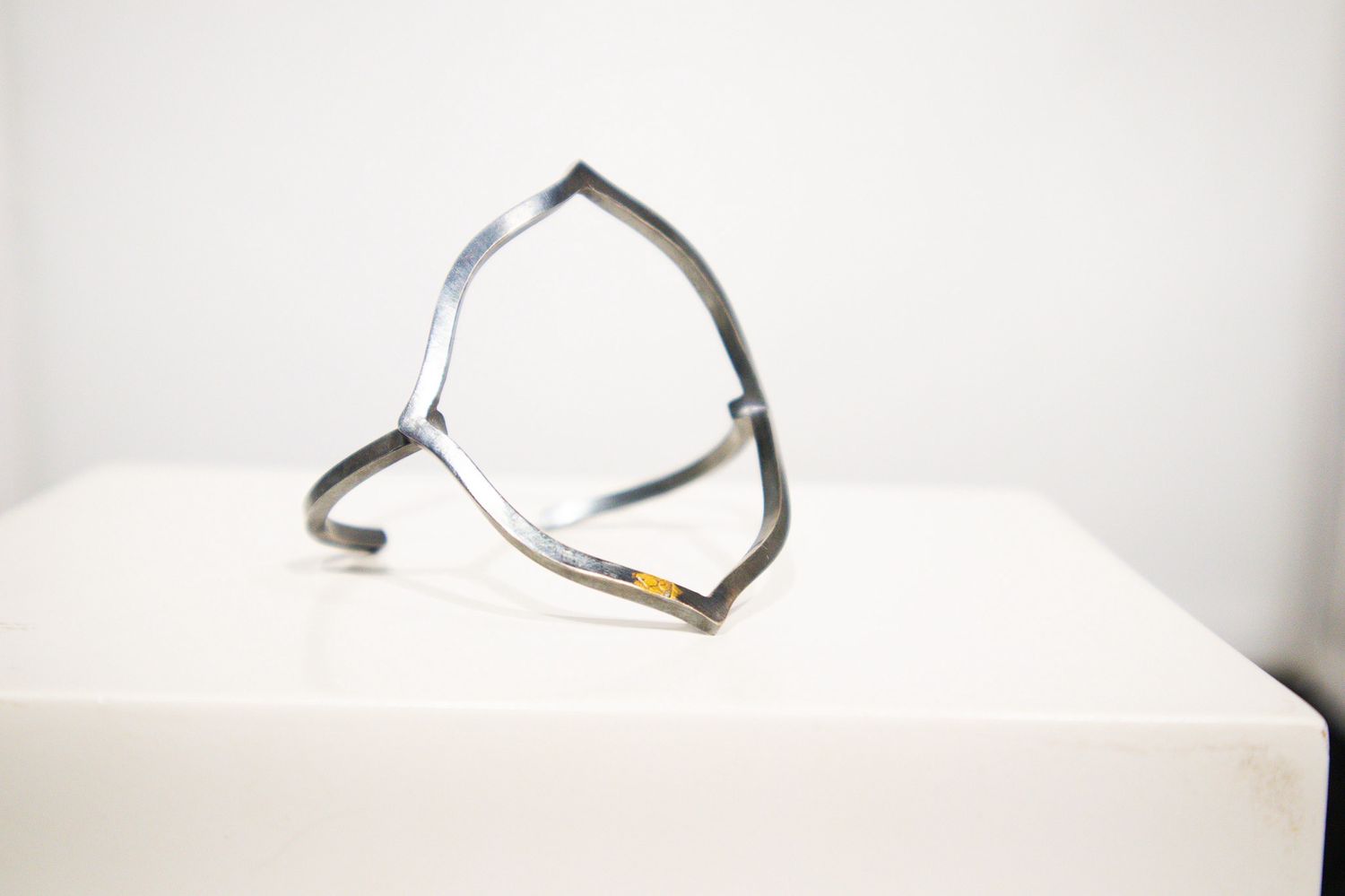 Quatrefoil cuff, Kelly Draper