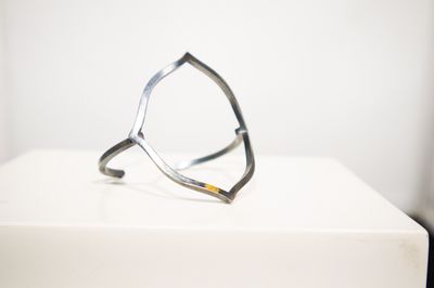 Quatrefoil cuff, Kelly Draper