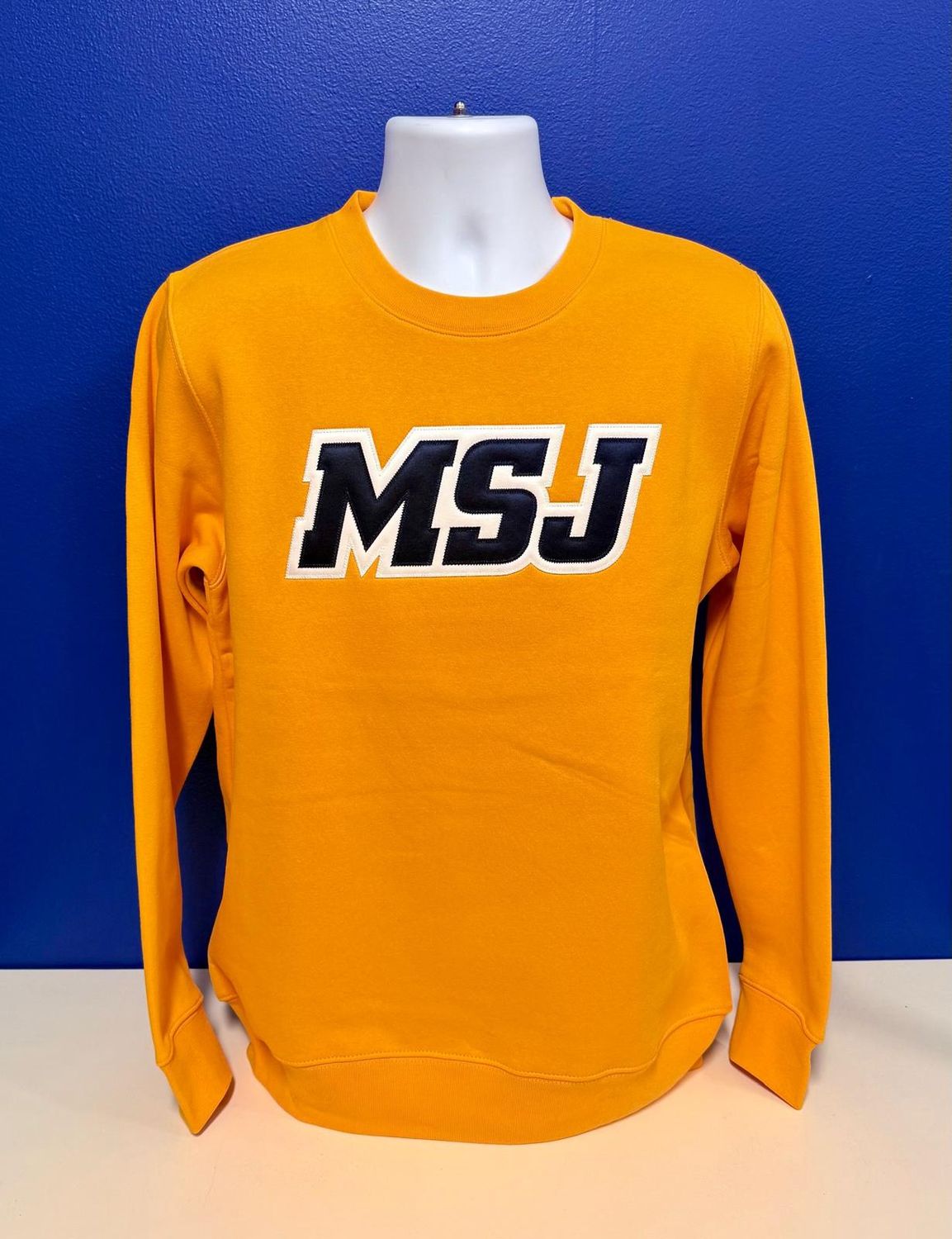 A Team Crew Gold MSJ Sport Logo