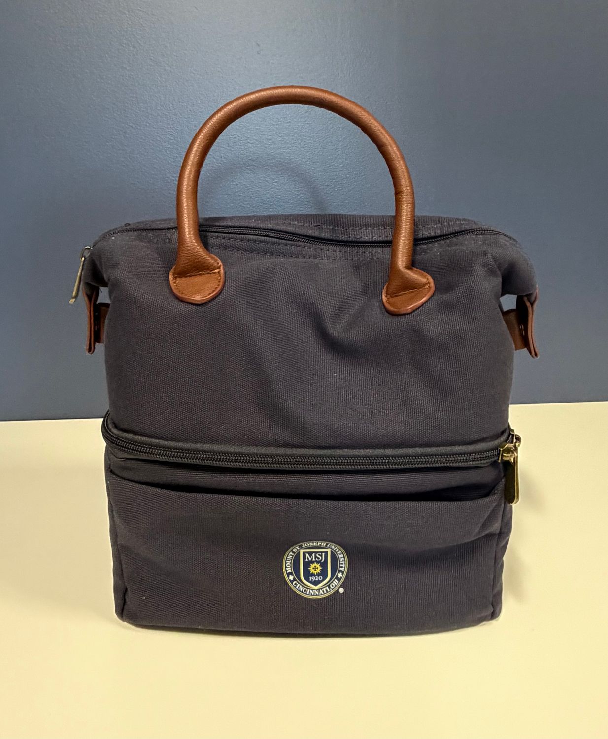 Urban Lunch Bag Navy w/ Brown Accents Mount St. Joseph University Circle Logo