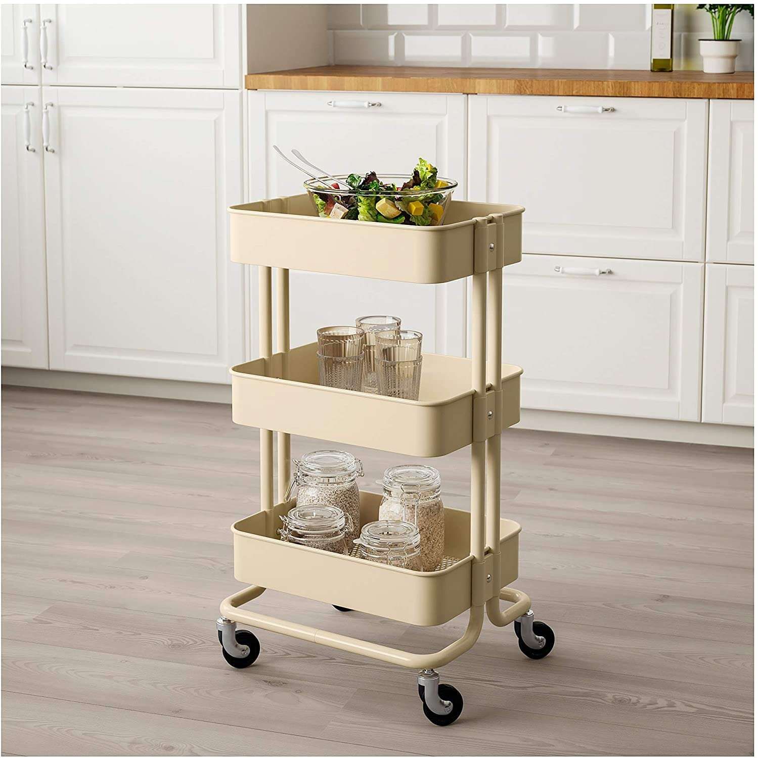 Trolley de metal con rodos  Medida: 45 x 34 x 82cms Color: Beige se envía armado