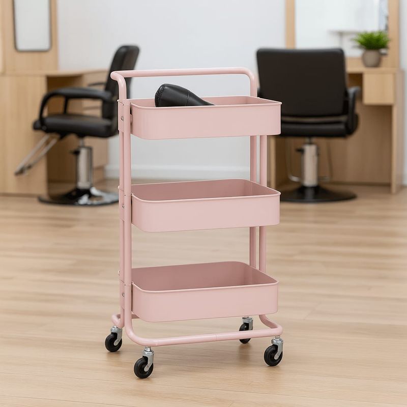 Trolley de metal con rodos  Medida: 45 x 34 x 82cms Color: Rosado se envía armado