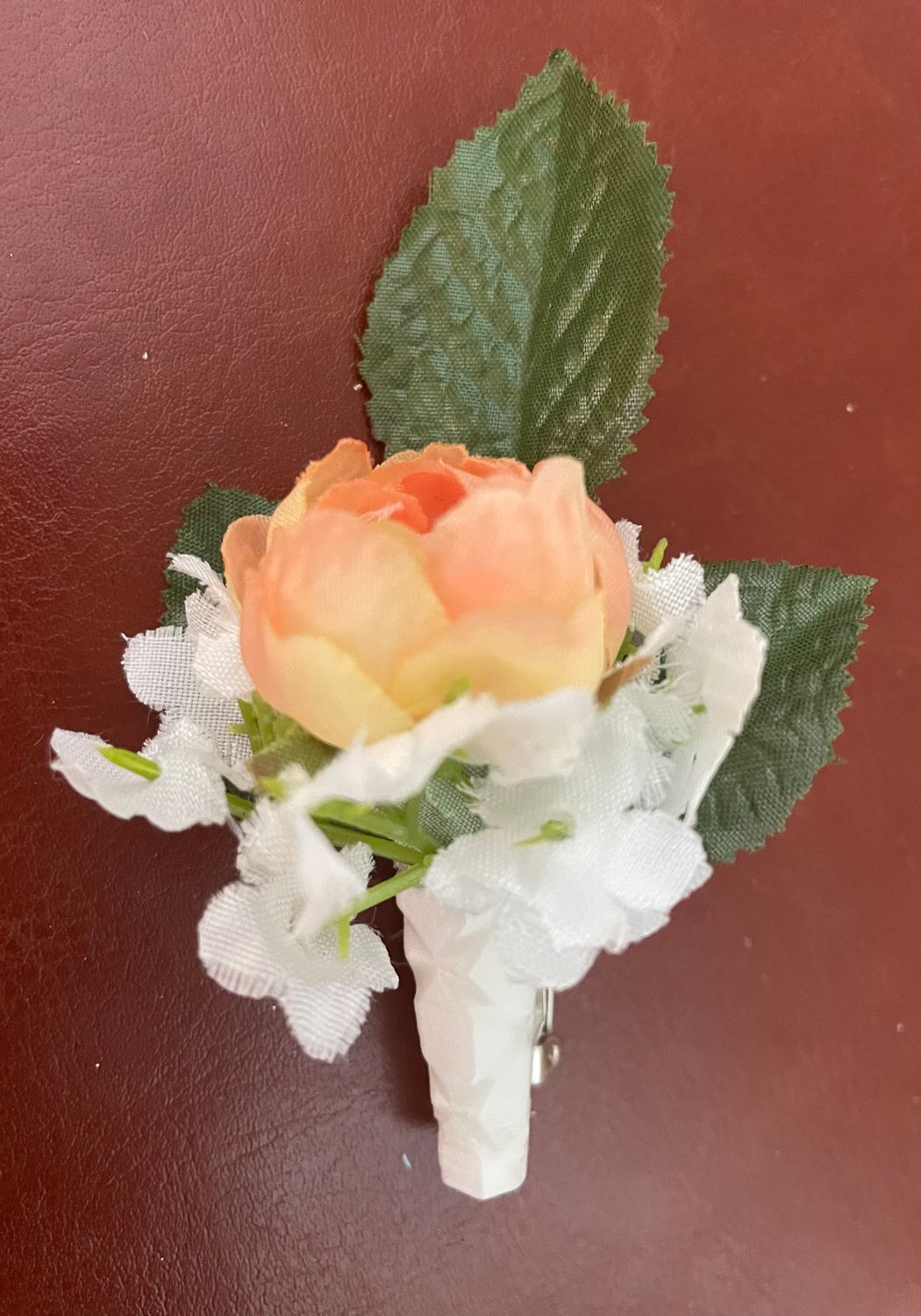 Orange African Violet Silk and White Boutonnière with Baby&#39;s Breath and Greenery