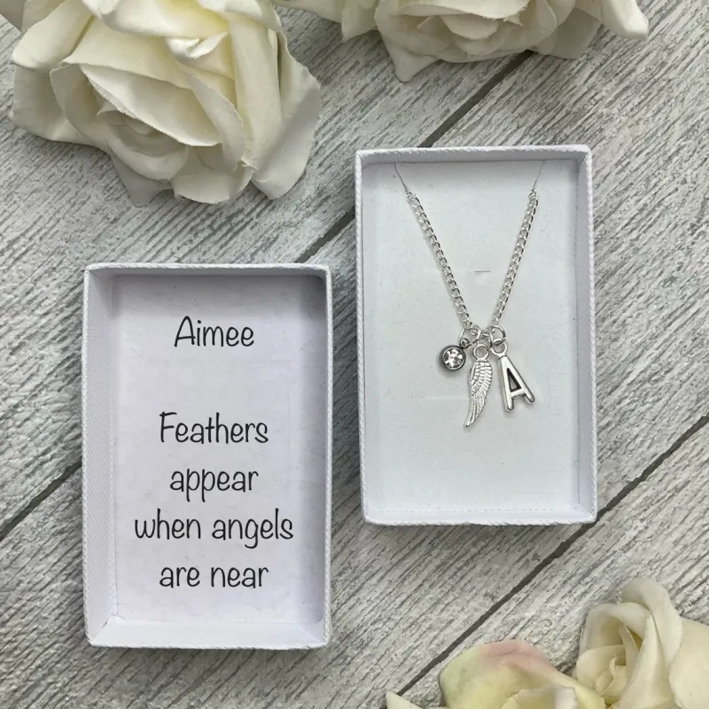 Feather necklace with feather, birthstone and initial charms