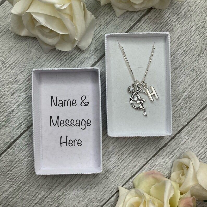Fairy sitting on the moon necklace with a fairy, birthstone and initial charms