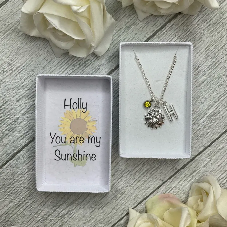 Sunflower necklace with a sunflower, birthstone and initial charms
