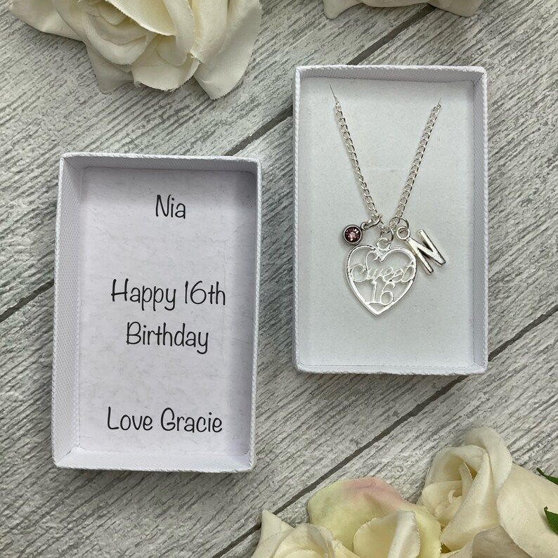 Sweet 16 necklace with a sweet 16 heart, birthstone and initial charms