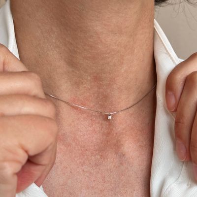 ÉSA GIROCOLLO ORO BIANCO CON DIAMANTE 0.03 CT