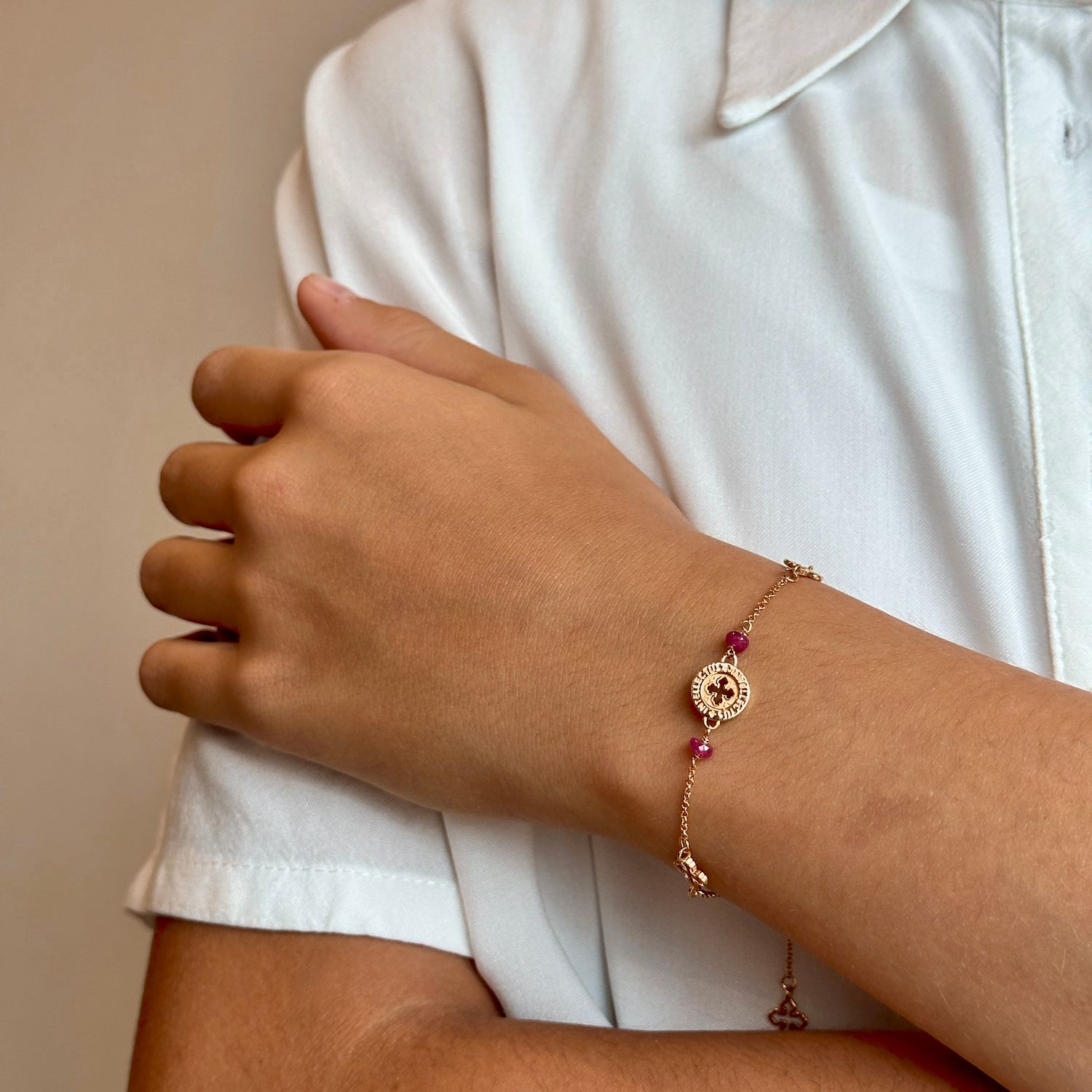 TUUM BRACCIALE IN ORO GIALLO 9kt. E RUBINI - INTELLETTO