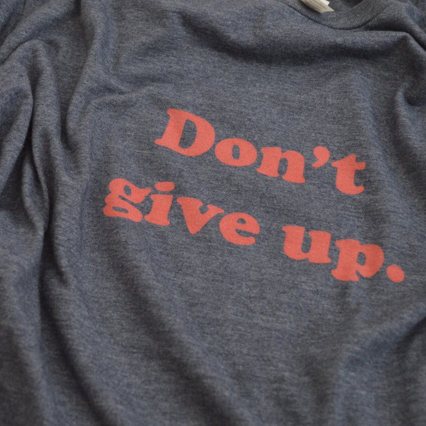 DON'T GIVE UP t-shirt - 10% of profits go to the ACLU.