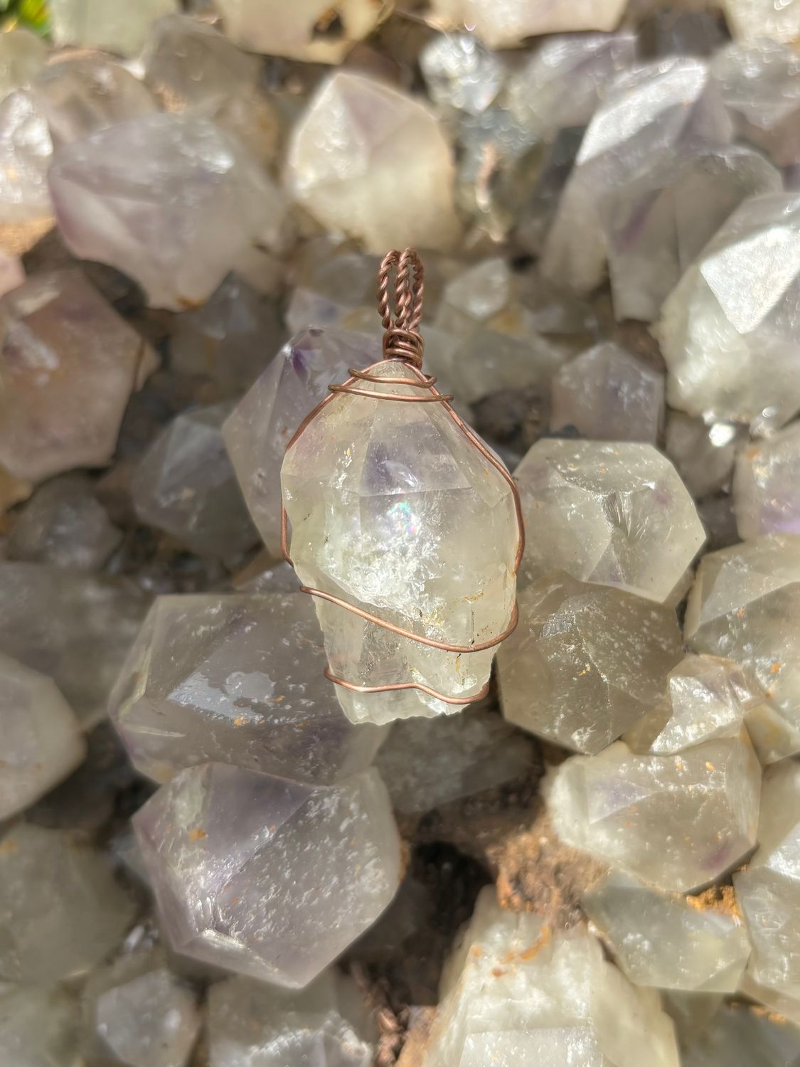Sunlight-Enhanced Amethyst Wrapped in Copper wire - Length: 1.92in | Width: .99in