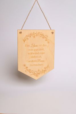 Schild &quot;Das Leben ist das was passiert ...&quot;