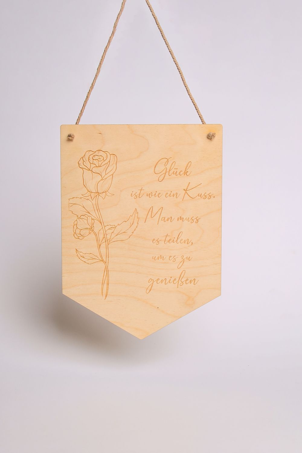 Schild &quot;Glück ist wie ein Kuss&quot;