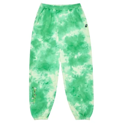 Front view of Malbon Grateful Dead Clubhouse Sweatpants in green tie dye with green printed artwork on right leg.