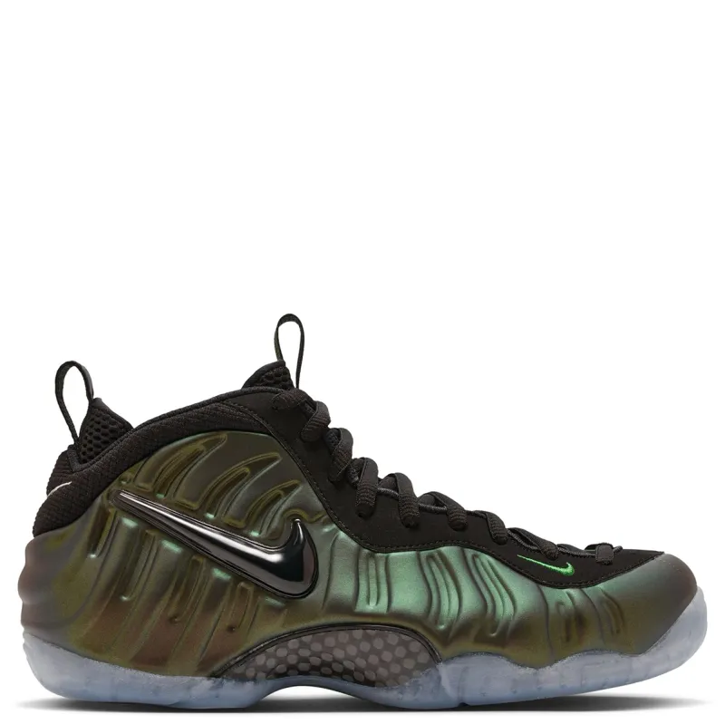 Lateral side view of Nike Air Foamposite Pro in Pine Green featuring molded Foamposite upper and black Swoosh.