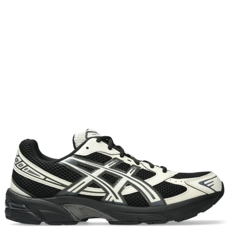 Right side view of ASICS GEL-1130 retro running sneaker in black and cream colorway.