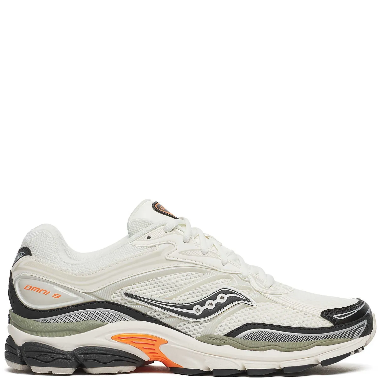 Side view of Saucony ProGrid Omni 9 TMY sneaker in white with turmeric accents and cream retro midsole.