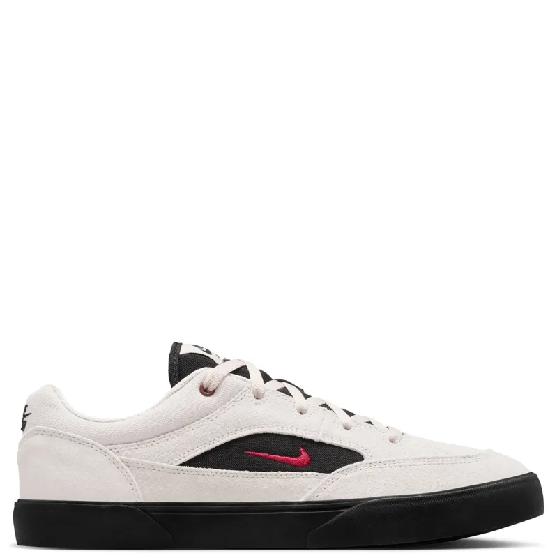 Lateral side view of Nike SB Malor with suede and canvas upper and black vulcanized sole.