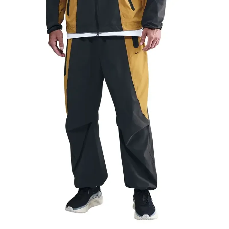 NIKE TECH DRI-FIT WOVEN COLOR-BLOCK OVERSIZED PANT 