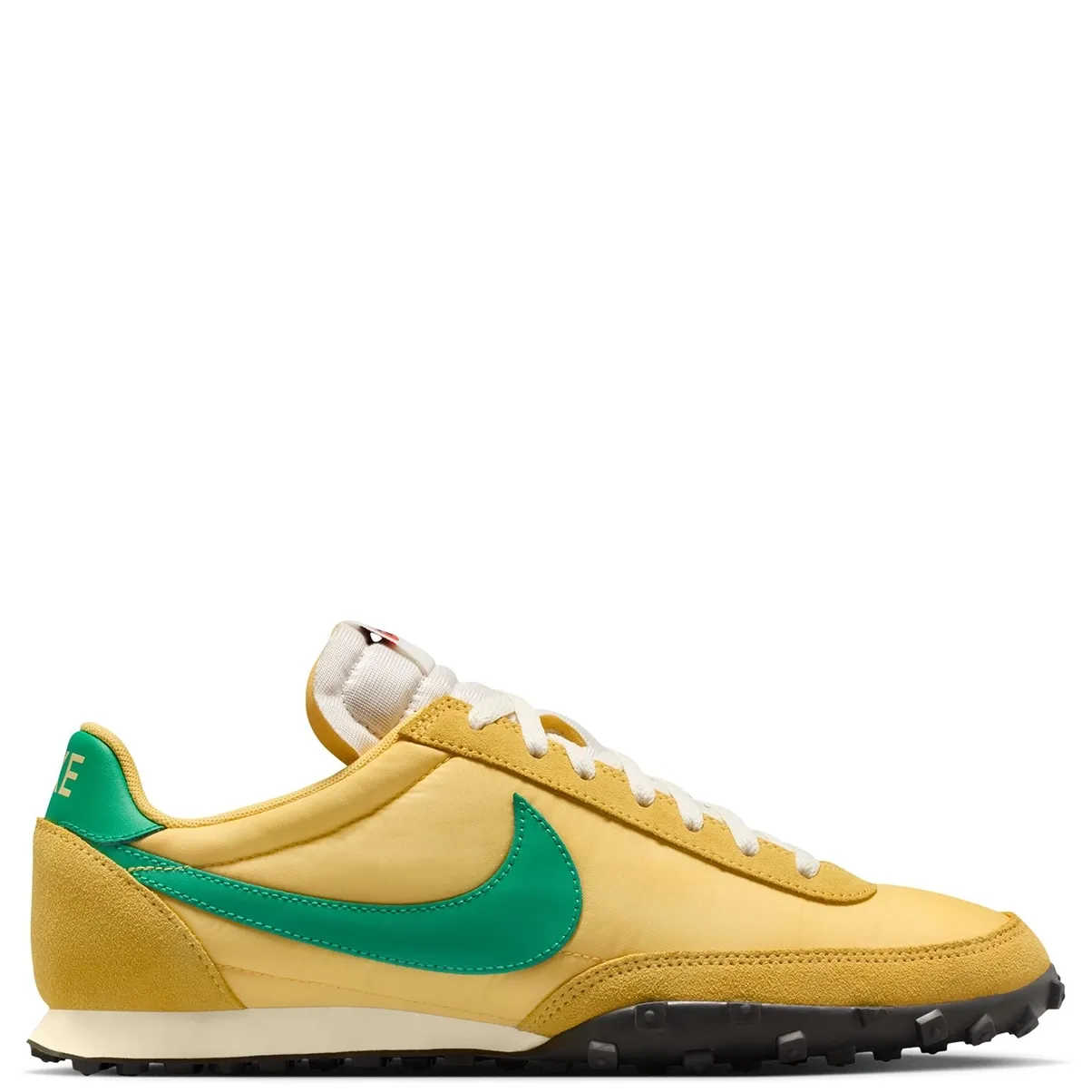 Lateral side view of Nike Waffle Racer in Topaz Gold featuring green leather Swoosh, suede mudguard, and low-profile midsole.