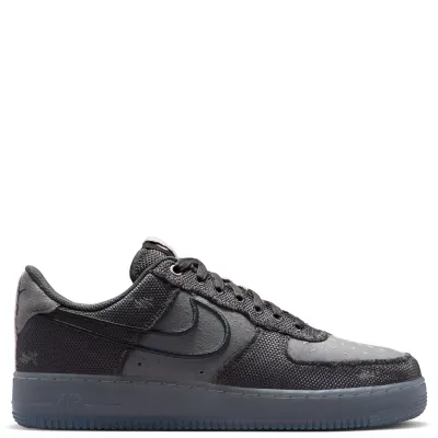 Lateral side view of Nike Air Force 1 ’07 in Iron Grey with classic Swoosh and Air midsole.