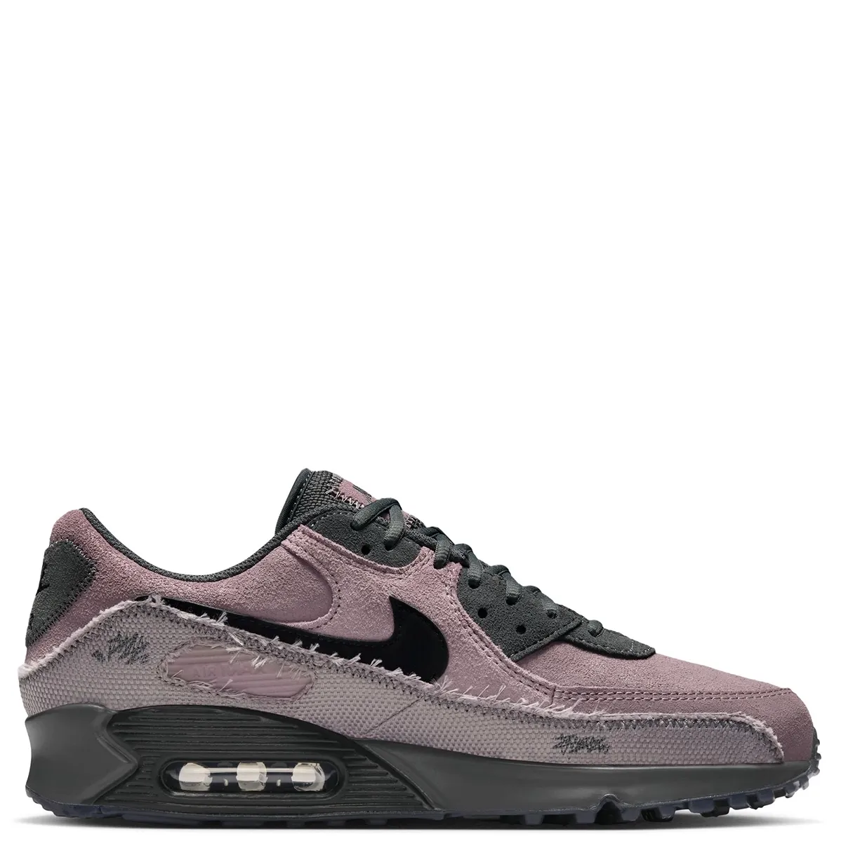 Lateral side view of Nike Air Max 90 Premium with textured panels and visible Air cushioning.
