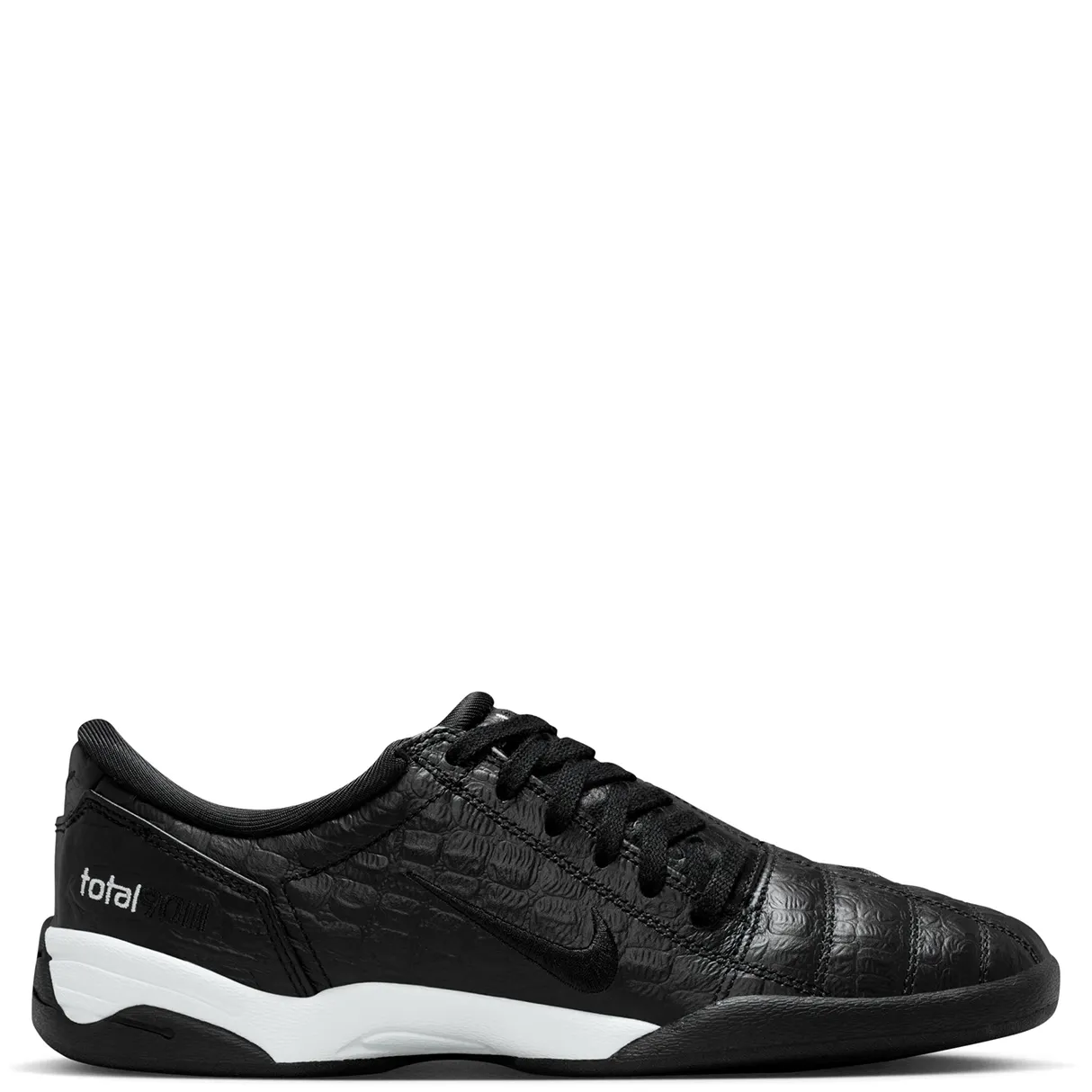 Lateral side view of Nike Women’s Total 90 Black White with stitched Swoosh and Total 90 branding.