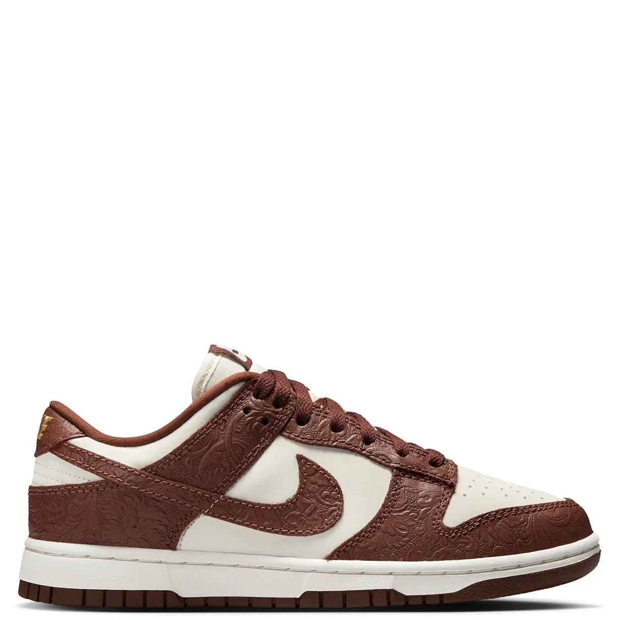 Lateral side view of Nike Dunk Low featuring Fauna Brown textured overlays and Sail leather panels.