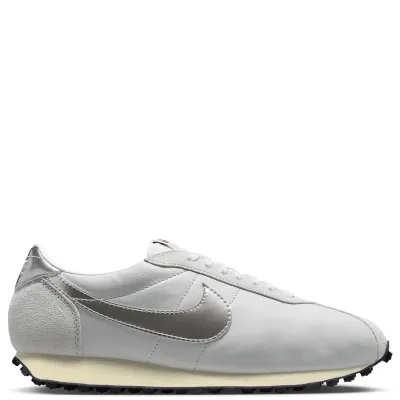 Lateral side view of Nike LD-1000 Photon Dust with metallic silver Swoosh and flared heel.