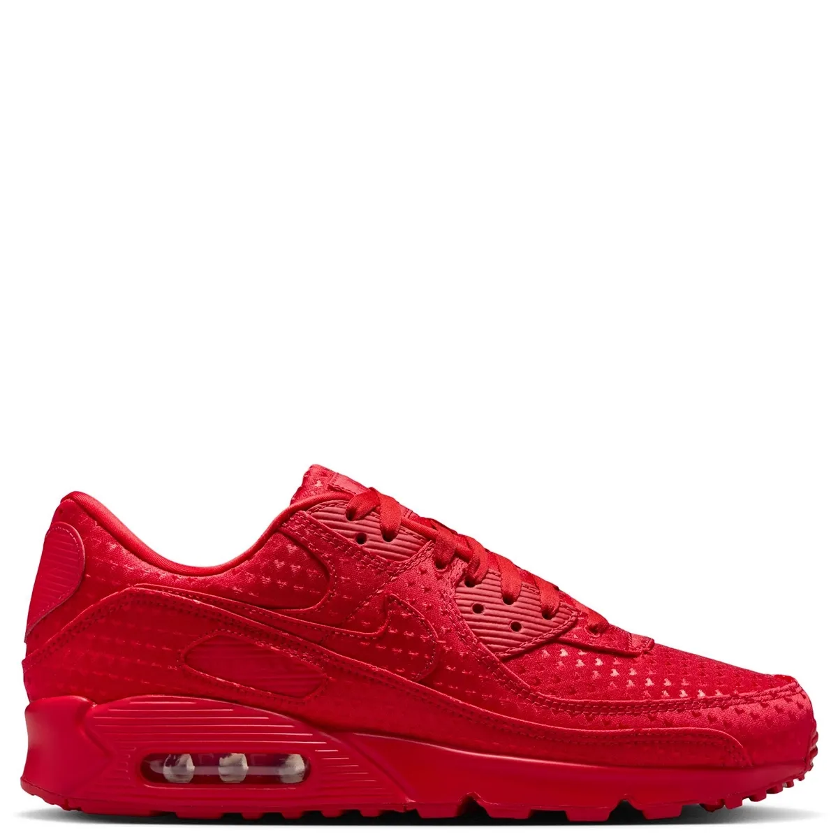 Lateral side view of Nike Air Max 90 Premium Valentine’s Day with monochromatic red upper and Air Max cushioning.