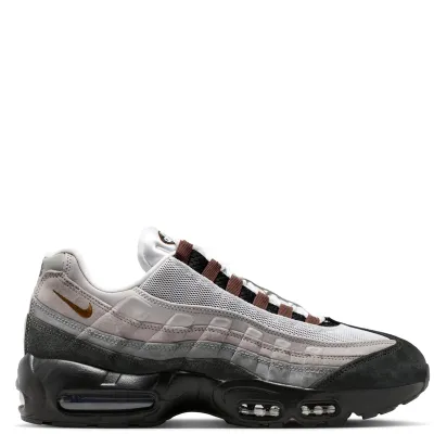 Lateral side view of Nike SB Air Max 95 with signature Air Max 95 wave design and visible Air cushioning.