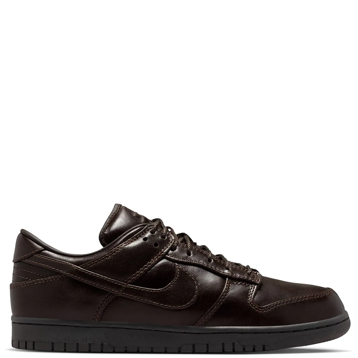 Lateral side view of Nike Dunk Low Retro Premium Classic Brown with leather Swoosh and low-profile sole.