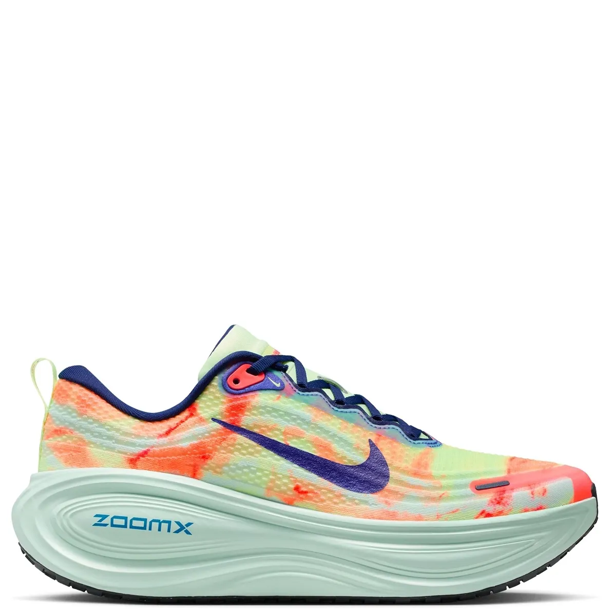 Lateral side view of Nike Vomero Plus with Indigo Swoosh and stacked ZoomX midsole.