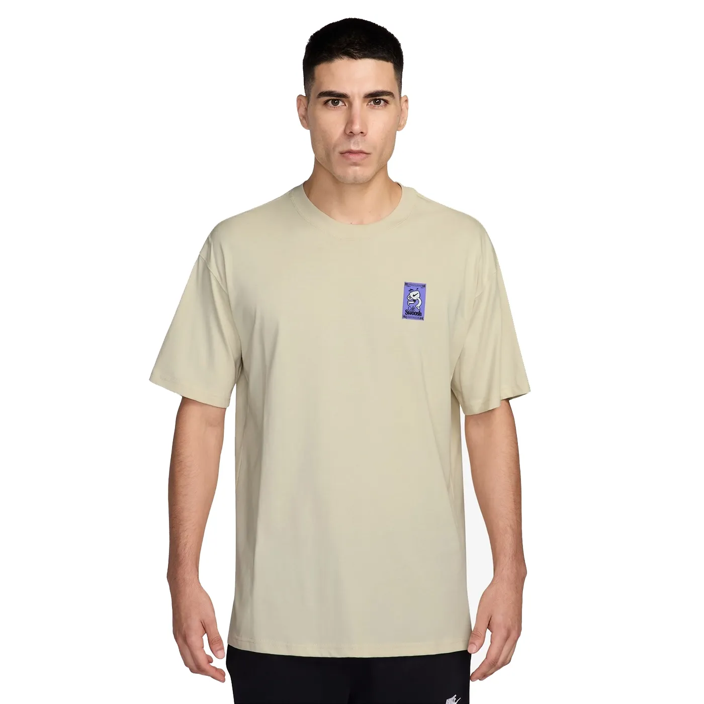 Front view of Nike Fresh Daily Tee in light khaki with small Café Swoosh chest patch