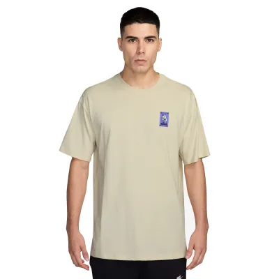 Front view of Nike Fresh Daily Tee in light khaki with small Café Swoosh chest patch