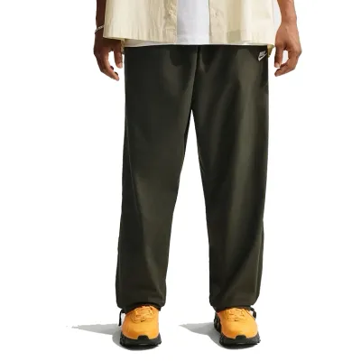 Front view of Nike Club Barcelona Pant in Sequoia showing relaxed fit and straight leg silhouette