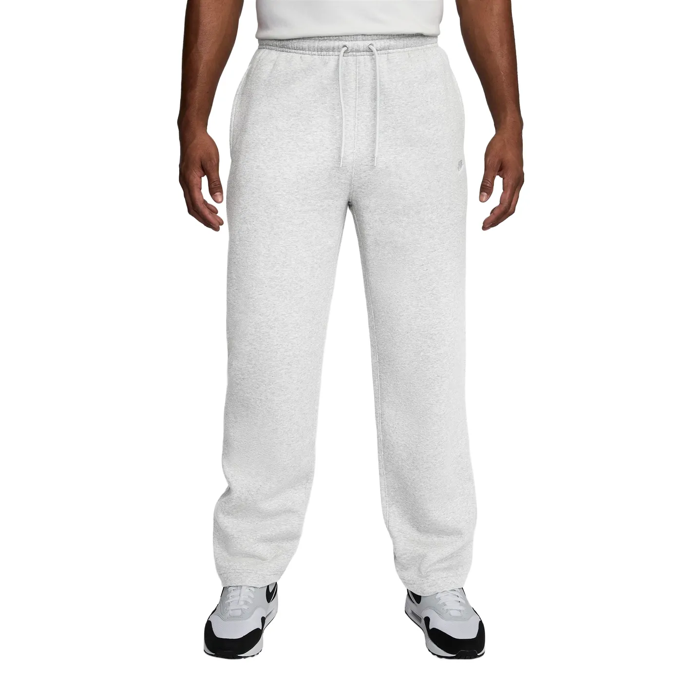 Front view of Nike Club Open Hem Pant highlighting straight-leg silhouette and waistband