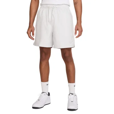Front view of Nike Club Flow Short in Photon Dust showing above-the-knee length