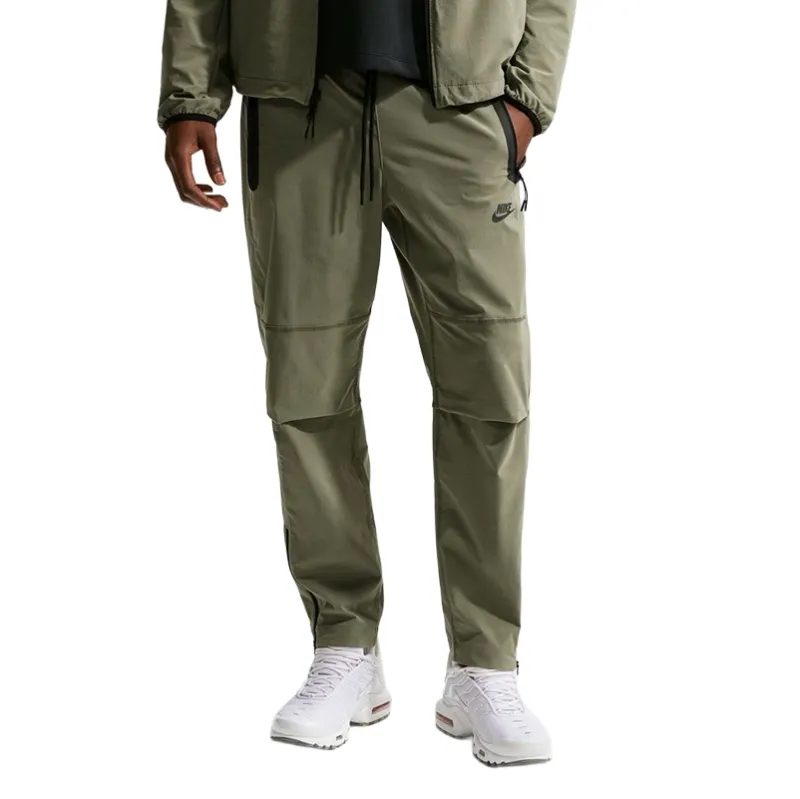 Front view of Nike Tech Woven Pant Silver Sage with Tech detailing