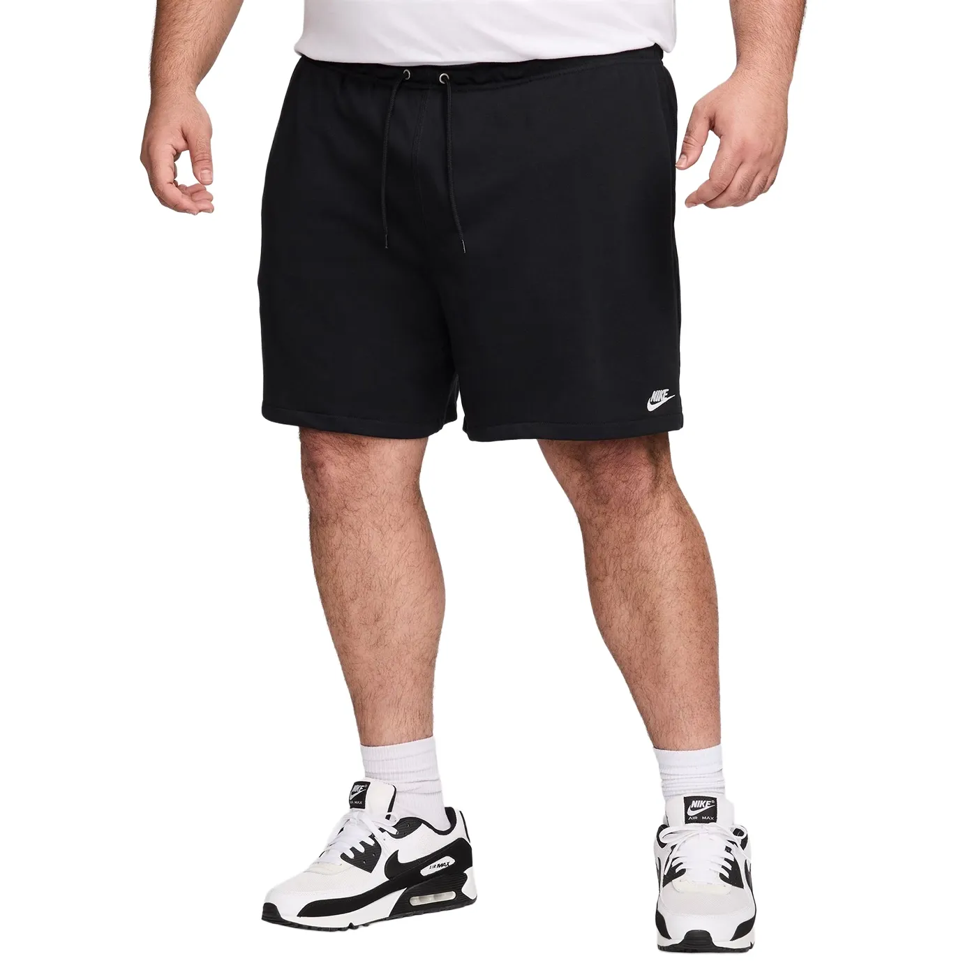 Front view of black Nike shorts with drawcord waistband and above-the-knee length