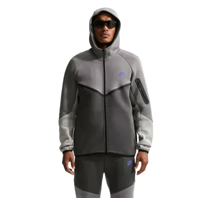 Front view of gray Nike Tech Fleece Windrunner with full-zip design and blue Nike logo