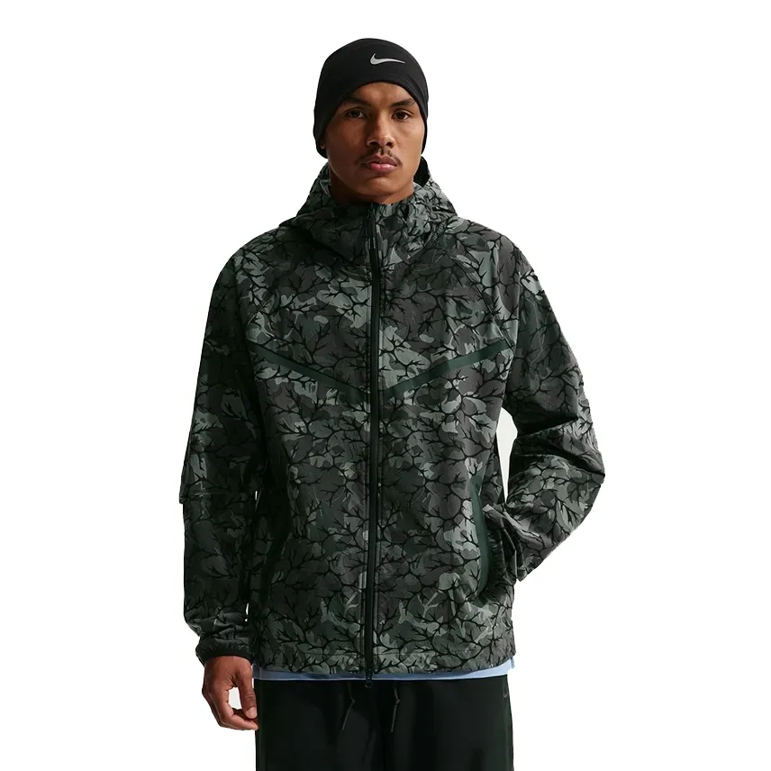 Front close-up of Nike Tech Windrunner jacket highlighting printed fabric and chevron lines