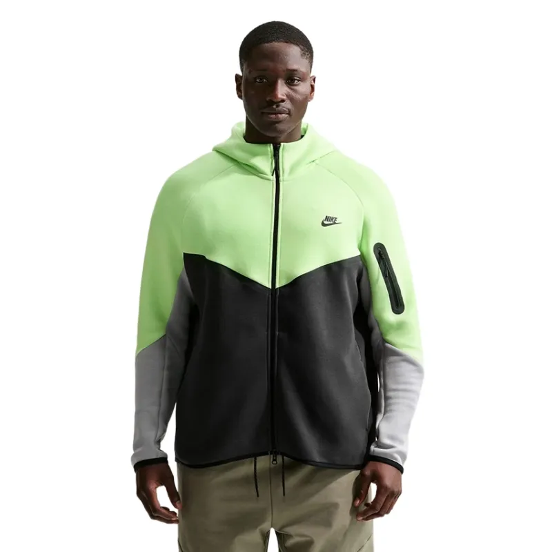 Full-body front view of model wearing Light Liquid Lime/Anthracite Nike Tech Fleece Windrunner jacket with hood up