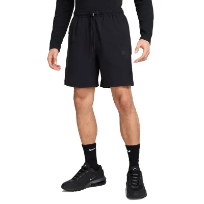 Front view of black Nike Tech Woven Shorts with relaxed fit