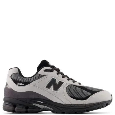 Lateral view highlighting N logo and layered upper construction on New Balance 2002R