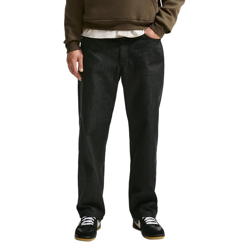 Front view of black Nike SB loose-fit denim pants 