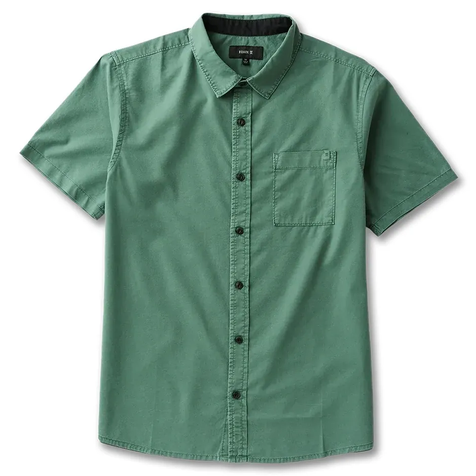 Flat lay front view of Roark short sleeve shirt in faded slate green with button front and chest pocket detail.